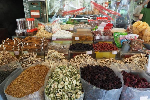 Products piled up on display on covered sidewalks are a common sight on Dihua Street.