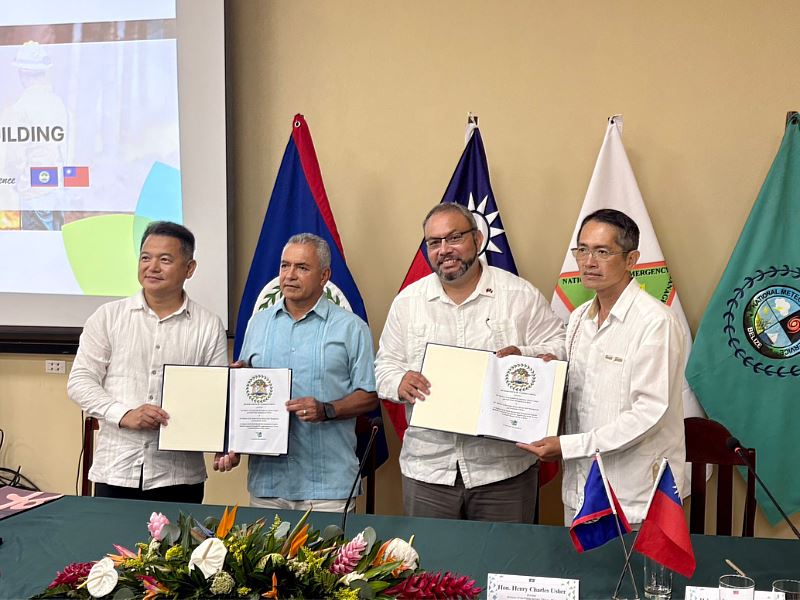 Ambassador Chi, Minister Habet, Minister Usher, and Mission Leader Su pose for a group photo following the MOU signing ceremony.