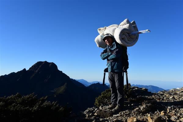 Xie Xintian was posted at the Yushan Weather Station at an elevation of 3,858 meters for more than 29 years.