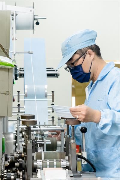 Production machinery built with the help of machine tools is used to manufacture life-saving surgical masks. (photo by Chin Hung-hao)