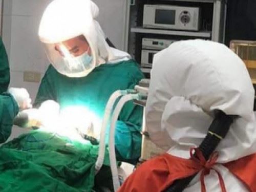 Full PPE is worn for surgery during the pandemic