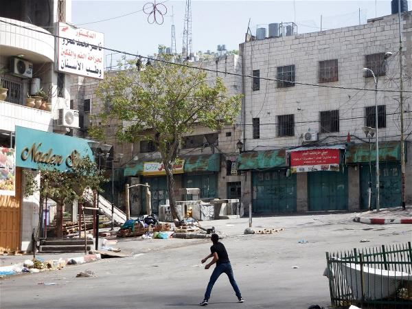 When Hu got caught up in a protest in the Palestinian city of Hebron, she realized that this was just an ordinary day for the local people.