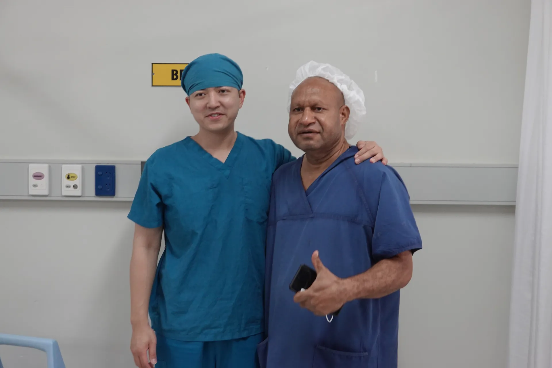 Dr. David Dr.  Chiang (left) from CCH’s Department of Orthopedics and Dr. Kune (right) pose for a photo.