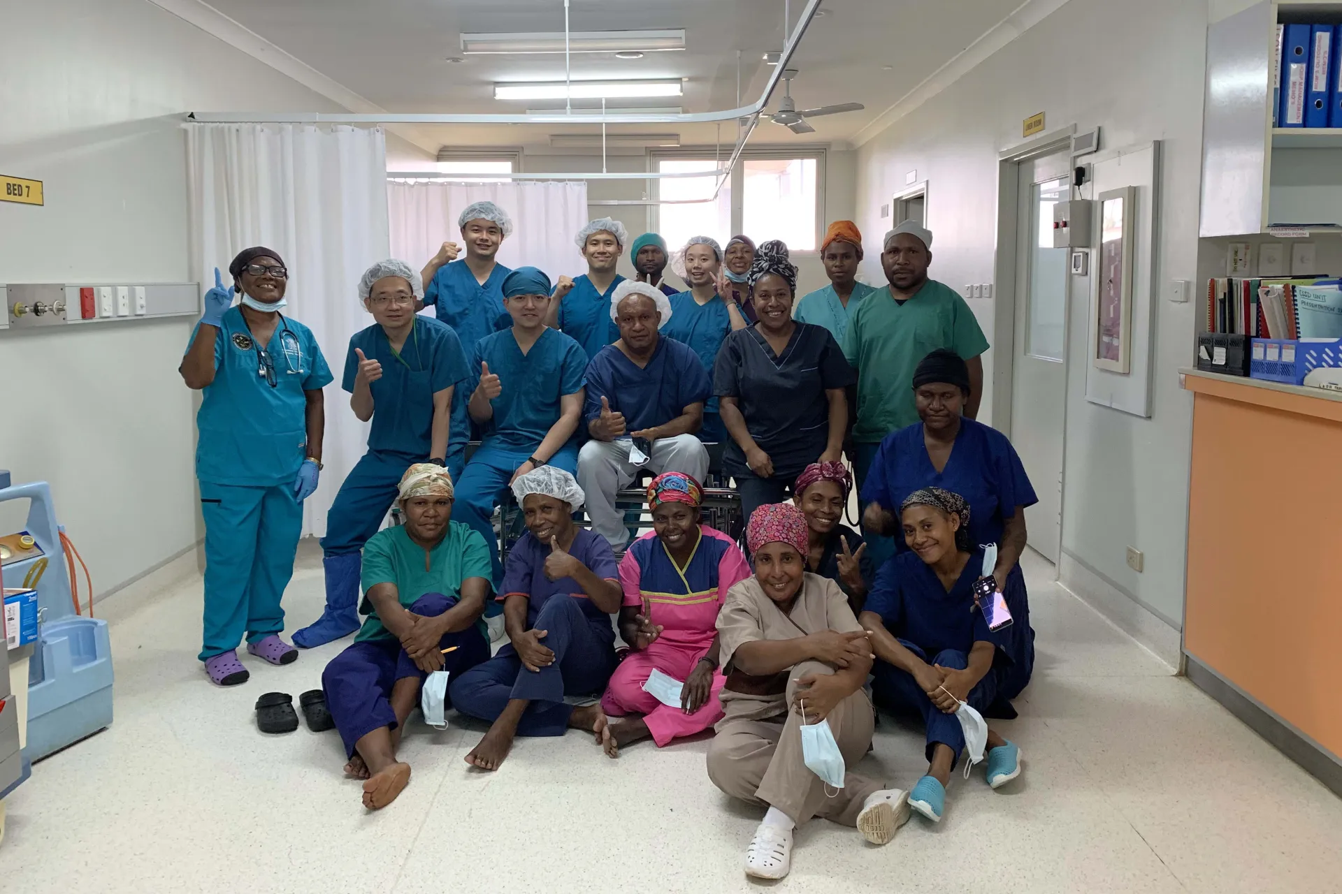 The CCH medical team poses for a group photo with the surgical team of Madang Hospital.