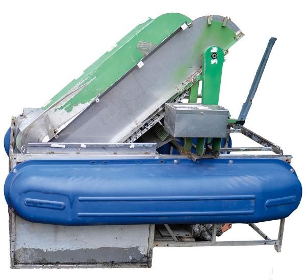 The first generation trash skimmer was little more than a pump and a conveyor belt. (courtesy of Team Azure)