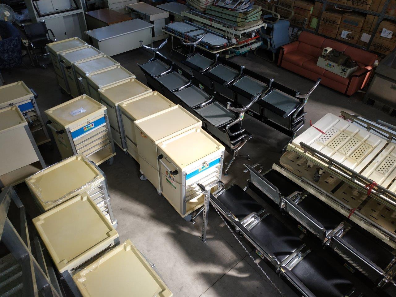 Donated medical supplies includes hospital trolleys and waiting chairs